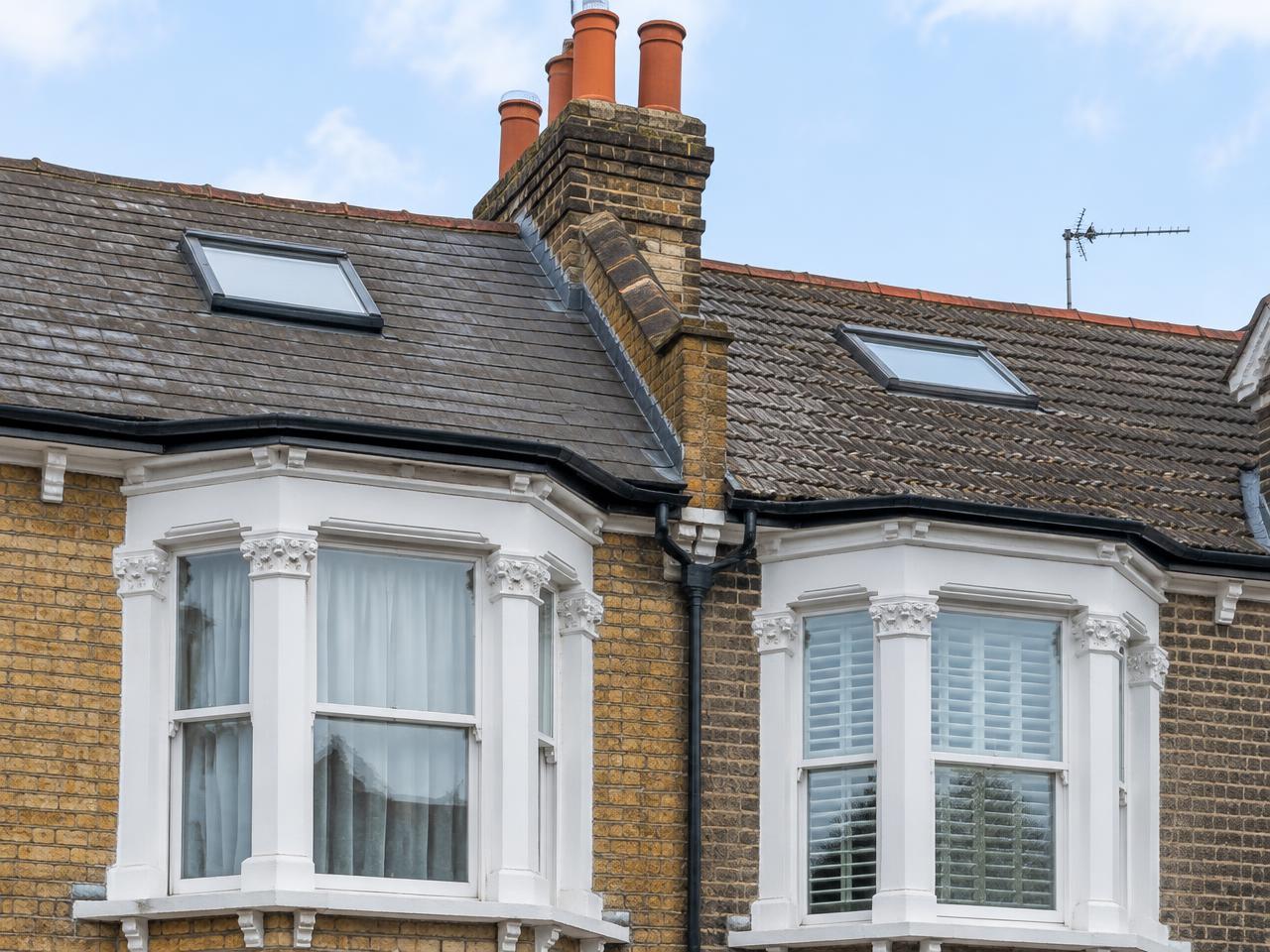 Pair of adjoining British homes in a party wall setting